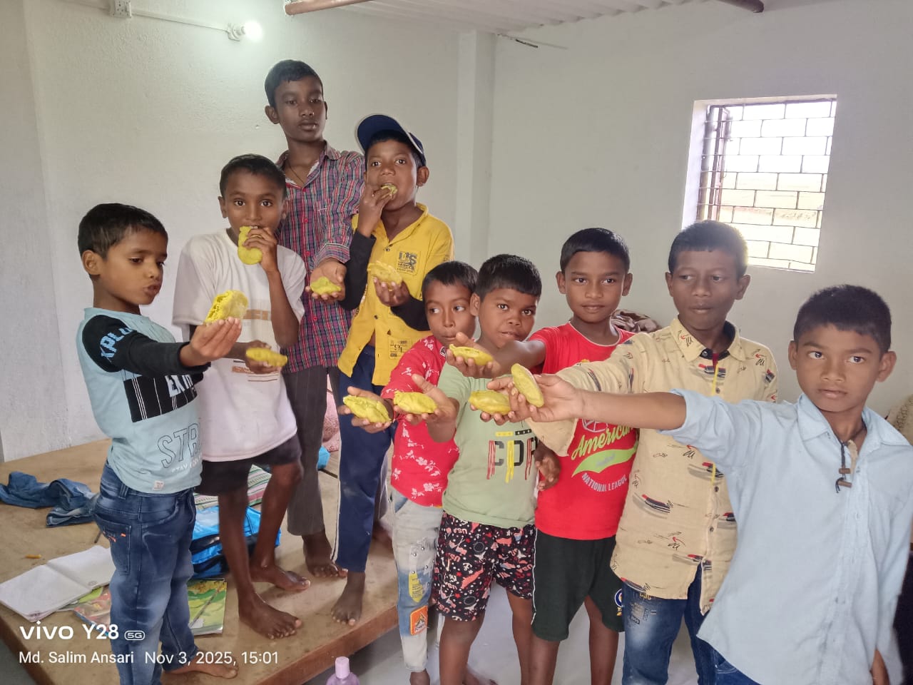 Volunteer serving food to children