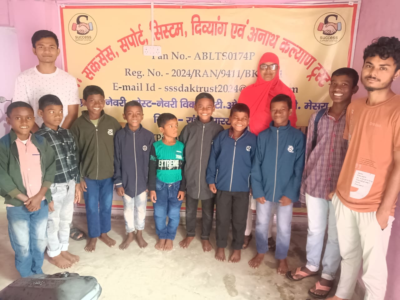 Caregiver with children at SuccessSupportSystem Divyang & Anath Kalyan Trust